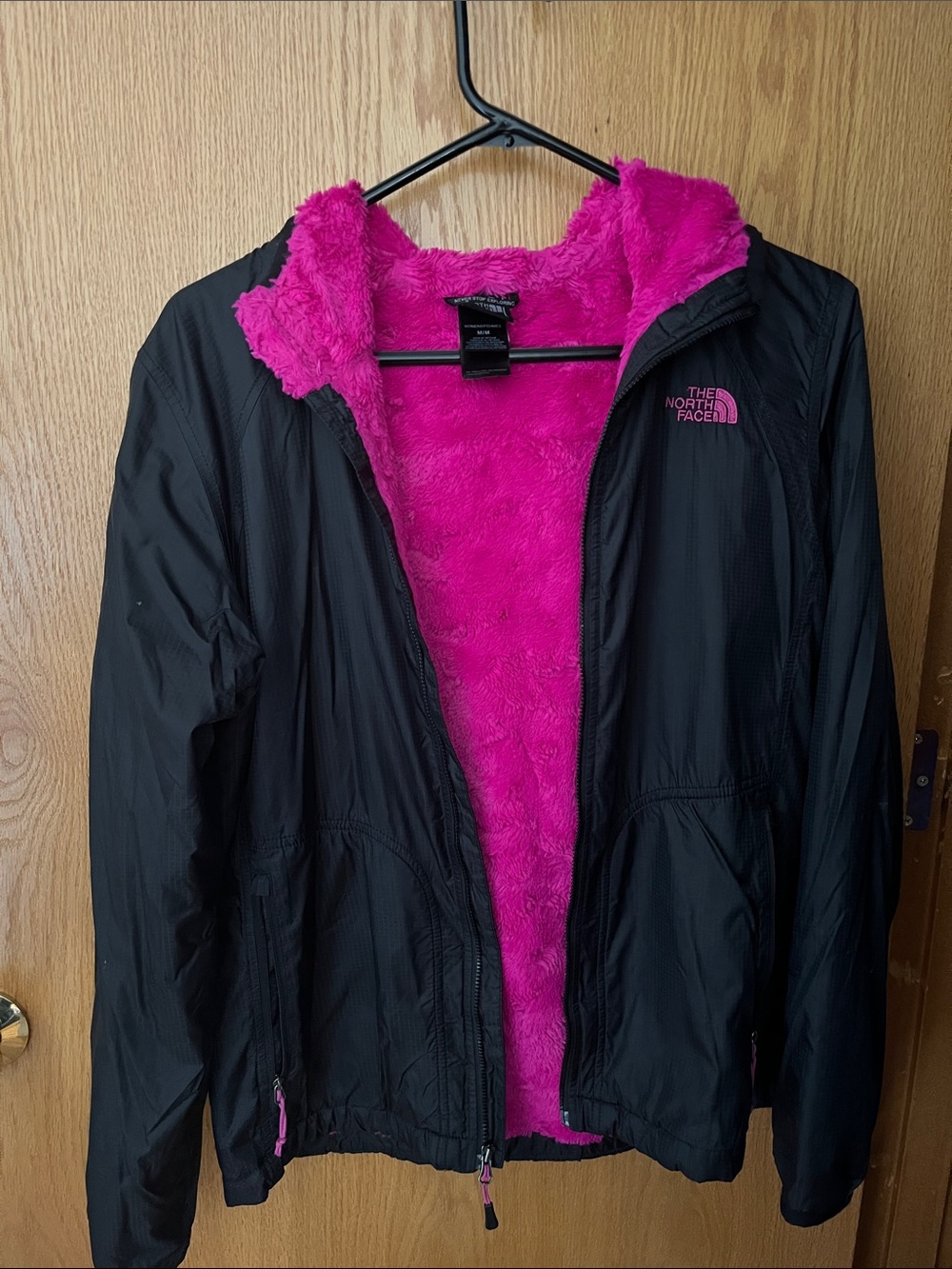 The North Face Women's Black Jacket with Hot Pink Faux-Fur Lining